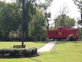 Walking Path and Caboose in Island Wooden Bridge Park